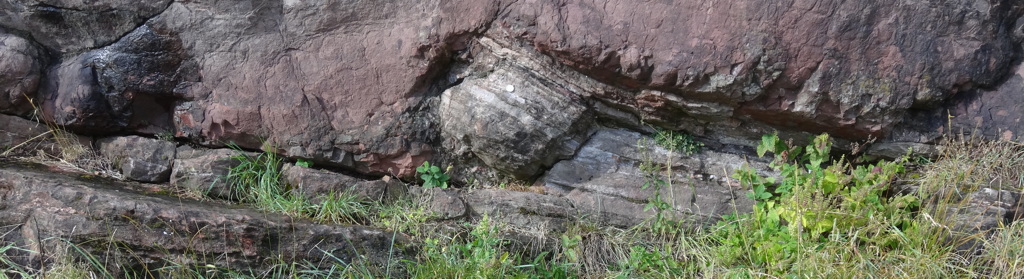 Igneous contact at Salisbury Crags in Scotland, where James Hutton correctly interpreted the relationship between the igneous rock and the sedimentary rock.