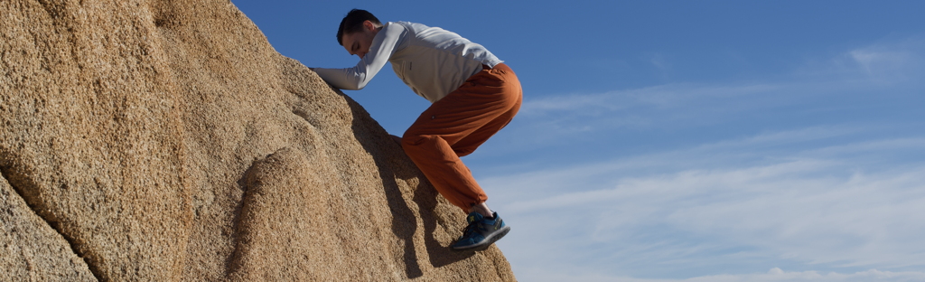 Connor Cronin friction-climbing on a granite of the Southern California Batholith at Joshua Tree National Park, California.